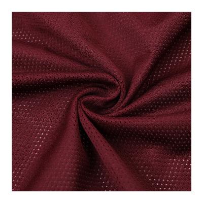 China Shrink-Resistant 100% Polyester Fabric Fine Mesh Eyelet Knitted Mesh Garment Fabric For Sportswear And Casual Wear for sale