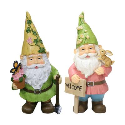 China Handmade Santa Claus Holiday Decorations Resin Garden Gnome Welcome Sign Elf Statues Minimalist Decoration Ornament Gnomes Hold Flowers for sale