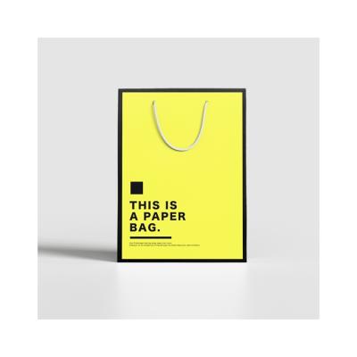 China Best Selling Recyclable Color Printed Custom Logo Paper Bag Fashion Clothing Tote Bags for sale