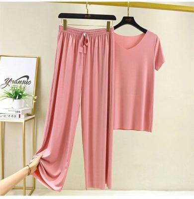 China Summer QUICK DRY Cheap Women Cool Solid Color Stretch Comfortable T-Shirt Pants Two Piece Set for sale