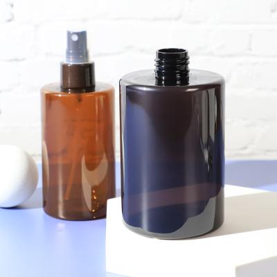 China Amber Black 16oz 350ml Cosmetic Cylindrical Spray PET Bottle Lotion Bottle Pump Plastic Bottles for sale