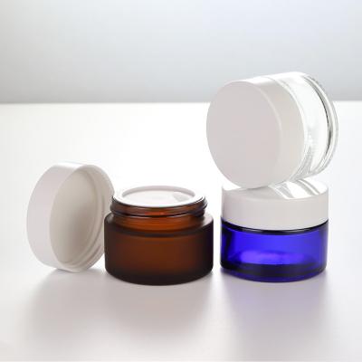 China 5g 10g 20g 30g 50g 60g 100g Single Blue Glass Cosmetic Cream Jar Frosted Empty Glass Cosmetic Jar for sale