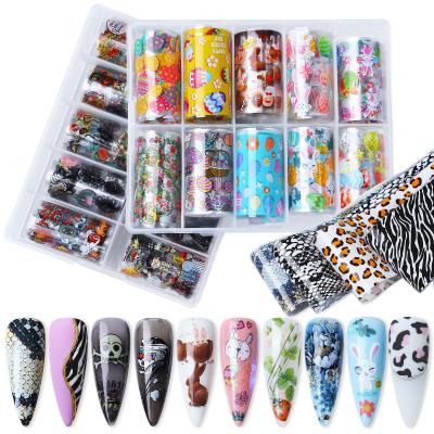 China Eco-friendly material and easy apply newest 4*100cm laser flower butterfly nail transfer foil snakeskin transfer paper 10design/Box for sale