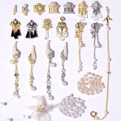 China 3d Nail Luxury Bao Color Zircon Heart Pearl 3D Bow Nail Art Decoration Zircon Wings Beating Light DIY Art Decoration for sale