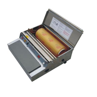 China Food TW-450F HUALIAN Fruit and Vegetable Semi-Automatic Cling Film Tray Wrapping Machine for sale