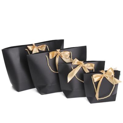 China Recyclable Luxury Ribbon Handle Boutique Shopping Bag Packaging Customized Printed Tote Paper Gift Bags With Ribbon for sale