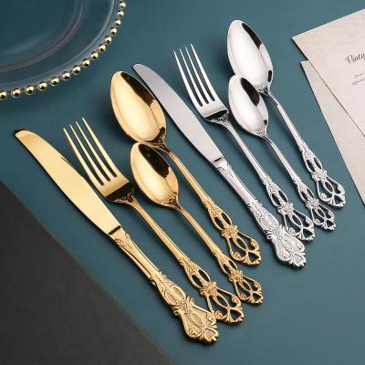 China Retro Embossed Royal Spoon And Steak Knife Stainless Steel Coffee Tableware European Spoon Hollow Cavity Knife Fork for sale