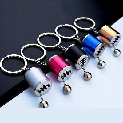 China Metal Car Modification Metal Key Chain Handbook Pendant Box Creative Gear Hang Small Gifts Key Chain for sale