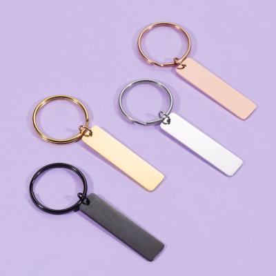 China Wholesale Custom Metal Logo Rectangle Black Gold Silver Copper Stainless Steel White Key Chain for sale