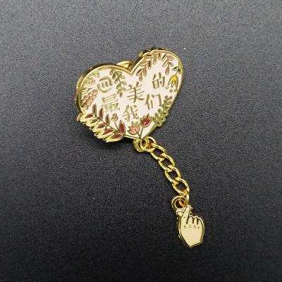 China Gifts Custom Wrapping Paper Card Gold Color Plated Soft Enamel Decoration Irregular Lapel Pin With Chain for sale