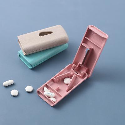 China Wholesale New-designed multifunctional portable scissors cutting pills splitting small cutter medicine dispensing box for sale