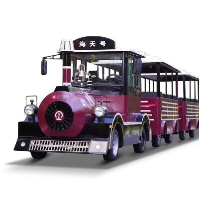 China Cloth 42 Passenger Train Locomotive Driving Tow Cart Electric Sightseeing Train For Amusement Park for sale