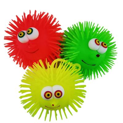 China Funny Anxiety Relife Toy Novelty TPR material Cartoon Smiling Face Glowing Hedgehog Puffer Ball for sale