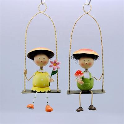 China Europe China Manufacturer Handicraft Boy And Hanging Swinging Girl Decor Wall Hanging for sale