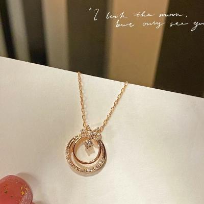 China CLASSIC Exquisite Pendant Necklace For Girl Double Circle Circles With Delicate Bling Cubic Zircon Bow Necklace Women Shape Jewelry for sale