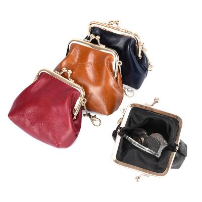 China Solhui Mini Coin Purse Keychain Women Vintage Clip Genuine Leather Wallets Coin Wallets Coin Storage Bag for sale