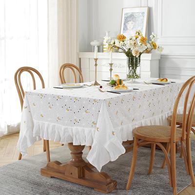 China 100% Polyester Pastoral Cheap White Embroidery Flower Yellow Ruffles Lace Up Modern Table Cloth for sale