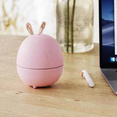 China Small cute multi-functional portable adjustable spray color dual light easy to clean cold fog car humidifier for sale