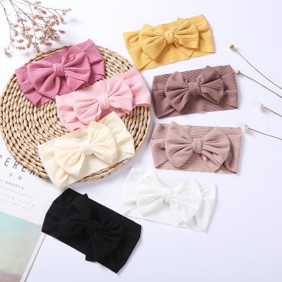 China European and American style new arrival baby headbands solid color cable striped soft bow newborn headbands cheap wholesale infant hair bands for sale