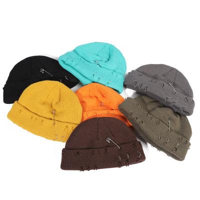 China JOINT Vintage Hole Adult Knitted Hat Winter Warm Outdoor Women Men Crochet Hat Fashion Skull Cap for sale