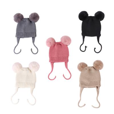 China New COMMON Autumn Winter Kids Caps 0-3y Baby Knitted Warm Hat With Earflap Children Pom Pom Beanie for sale