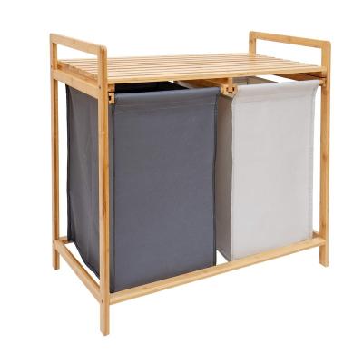 China Natural wholesale Bamboo Laundry Hamper and Shelf 2 Sections Laundry Basket with Removable Liner for sale