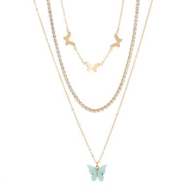 China Ladies Three Chain Pendant Necklace Romantic Diamond Butterfly Necklace Design New Gold Plated Iron Zinc Alloy Necklace for sale