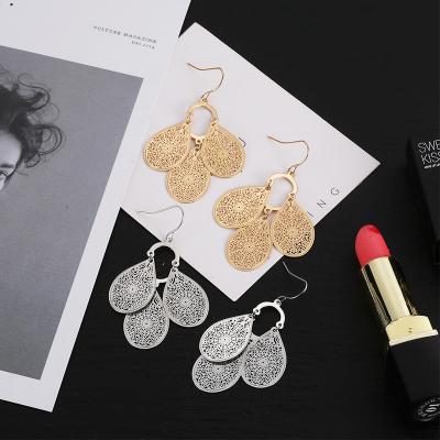 China Hot Selling Women's Fashion Vintage Circle Drop Earrings Dangling Gold Fashion Hollow Creative Geometric Shape Earrings For Women for sale