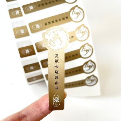 China Matte Gold Paper 10ml Energe Waterproof Stain Rabbit Bottle Label Custom Printed Liquor Bottle Glossy UV Label for sale