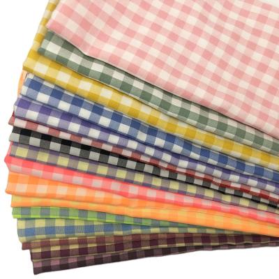 China Wholesale Breathable Simple Price New Design Fluorescence Cheap Color Woven Plaid Yarn Dyed Fabric For Shirts And Dress for sale