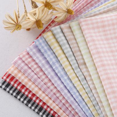 China Wholesale breathable No MOQ sale quality stocklot jacquard yarn dyed woven fabric bamboo screened plaid fabric for shirts and dress for sale