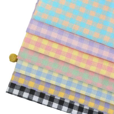 China Hot sale breathable 21S high quality dyed 100 cotton plaid flannel fabric for men's shirt in stocklot for sale