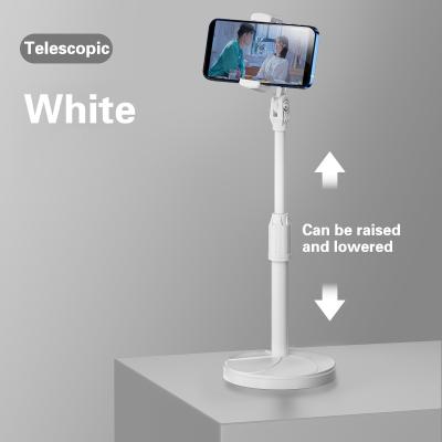 China New Adjustable Creative Telescopic Folding Bracket Mobile Phone Tablet Desktop Stand for sale