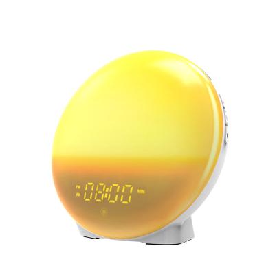 China Colorful Radio 7 Night Light Wake Up Light Sunrise Alarm Clock With FM Radio for sale