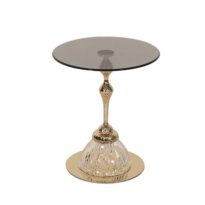 China Unique Shiny Finish Stainless Steel End Table Gold Metal Base Black Glass Top for sale