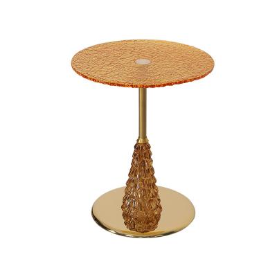 China Wave Tea Color Glasss Top Unique Design Shiny Finish Stainless Steel End Table Gold Metal Base for sale