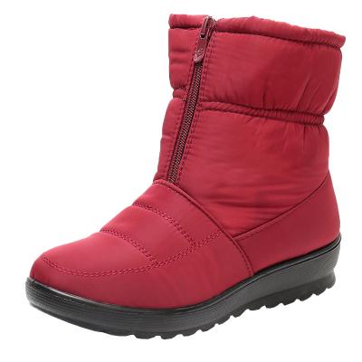 China Winter Snow Waterproof Non-slip Flat Bottom Round Boots Shorts Plus Velvet Cotton Thick Shoes For Women for sale