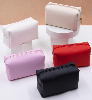 China Factory Wholesale Good Quality Eco-friendly PU Cosmetic Sweeps Waterproof Wash Waterproof Travel Toiletry Bag Makeup Cosmetic Bags for sale