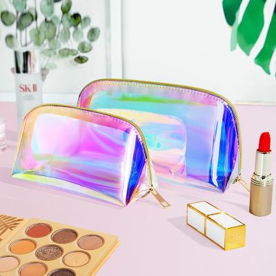 China Travel bag rainbow cosmetics package shell tpu logo laser transparent cosmetic bags custom waterproof eco-friendly TPU makeup clear bags for sale