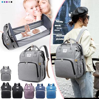 China Multifunctional Water Resistant Factory Baby Diaper Bag Backpack With Urinal Protection Storage Driver Pocket Travel Diaper Heating Bags For Men for sale