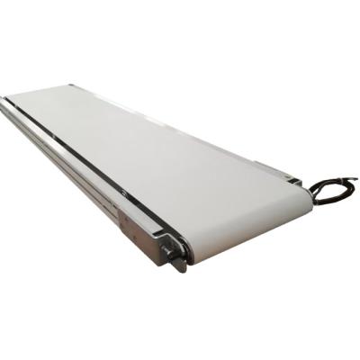 中国 Oil Resistant Stainless Steel Belt Conveyor Driven By Drum Motor 販売のため