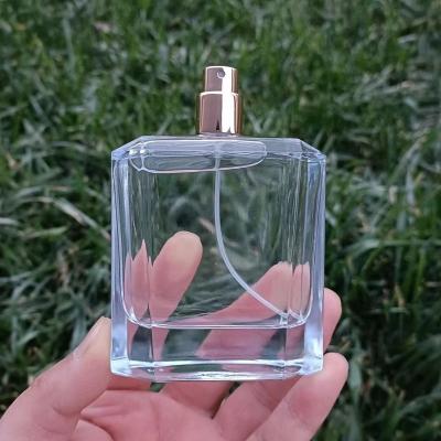 China High Quality China Cosmetic Factory 30ml 50ml Pump Lady Portable Travel Refillable Perfume Bottle With Cap for sale