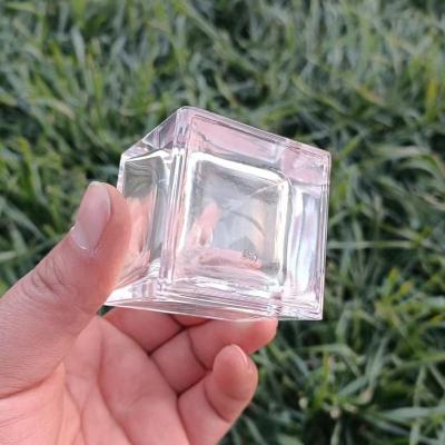 China Large Cube Glass Cosmetic Perfume Bottles Wholesalers With Resin Cap High Quality PUMP SPRAYER for sale