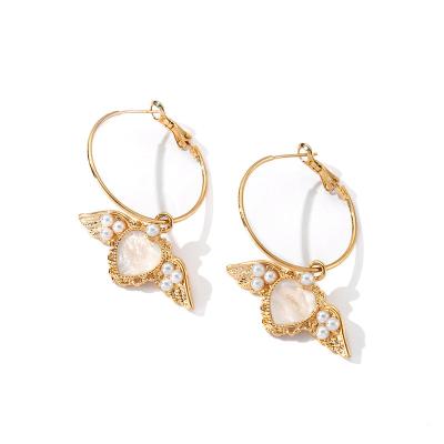 China Hot Selling Environmental Friendly Heart Wing With Shell Hoop Design 18K Gold Plating Earrings For Women for sale