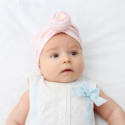 China Wholesale Hot Dobby Style Kids Hats With Donut Cloth Skullcap 18 Colors Baby Newborn Infant Hats for sale