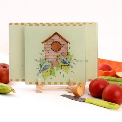 China Viable Bird's Clear Tempered Glass Home Worktop Saver Cutting Board for sale