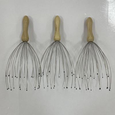 China Relaxes Stressed Muscles Helps To Relieve Aches And Pains Head Handheld Scalp Massager Product Wooden Handle 24 Claw Massager Head Tool To Relieve Stress And Relax Lettering body customer for sale