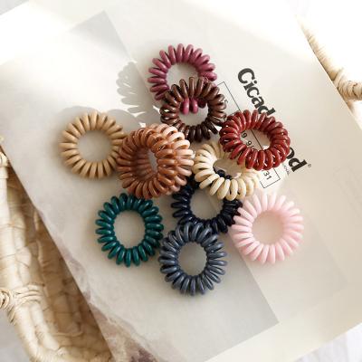 China Fashionable high quality telephone line for girl hair accessories and new design spiral developed hair band traceless hair rings for sale