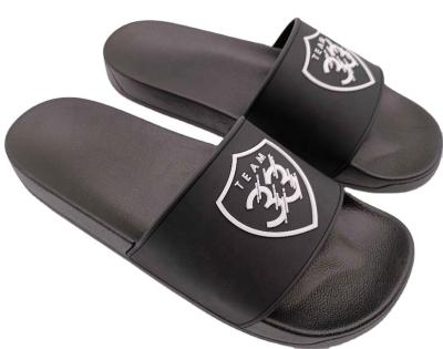 China Fashion trend high quality black unisex 3d pvc printing logo raised rubber embossed slide slippers for sale