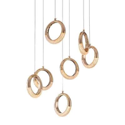 China Luxury Modern Gold Nordic Triple Light Restaurant Halo Chandelier Circle Hanging Line Staircase Bar Headboard End Single Head Earring for sale